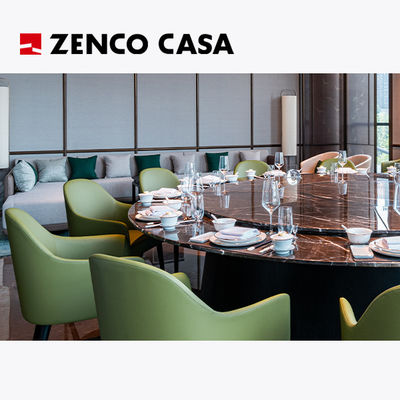Die Möbel des Hotels und des Restaurants beinhalten einen rotierbaren Marmor-Runden Tisch und grüne Ledersessel.